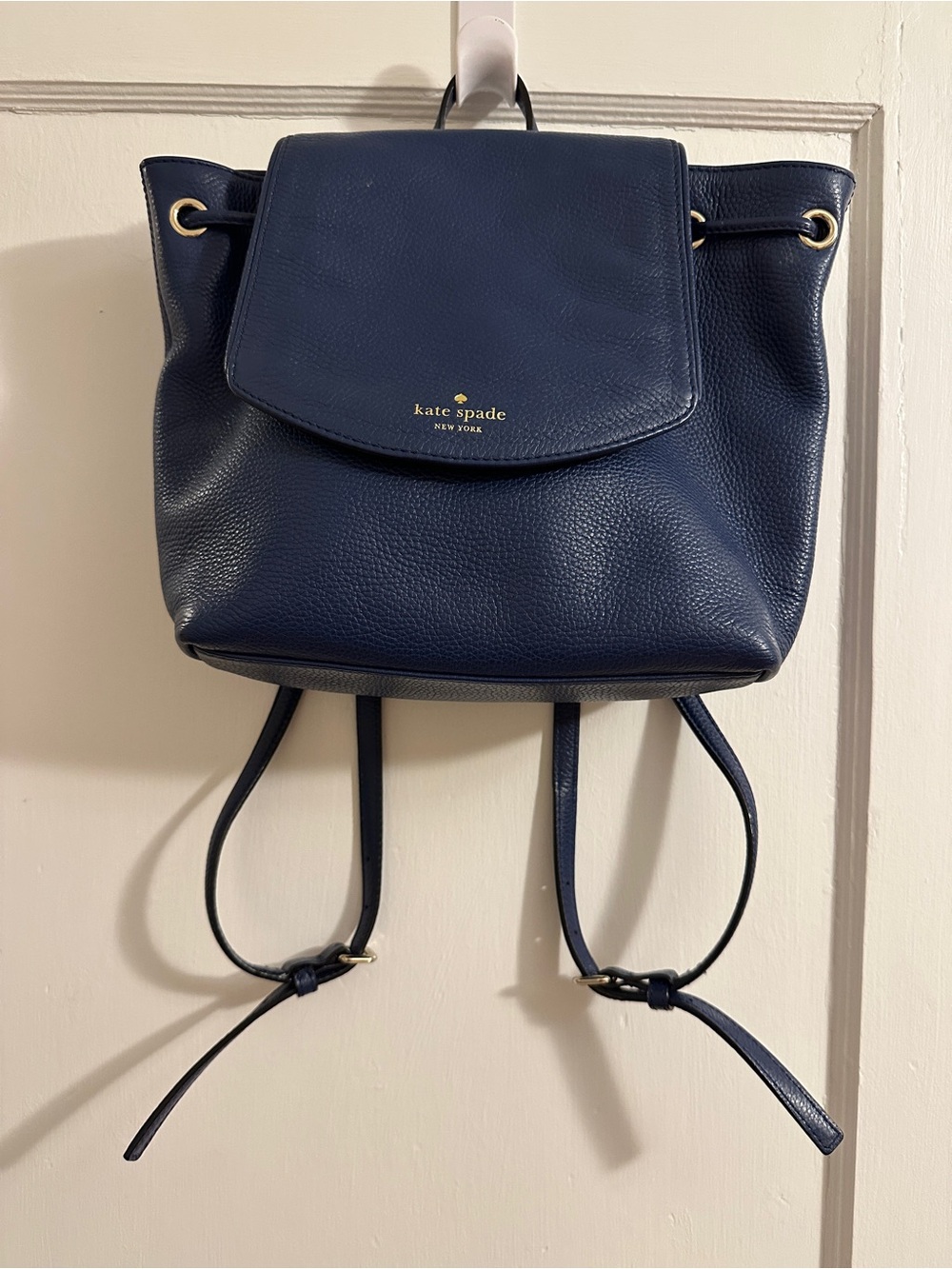 kate spade navy pebbled leather drawstring backpack